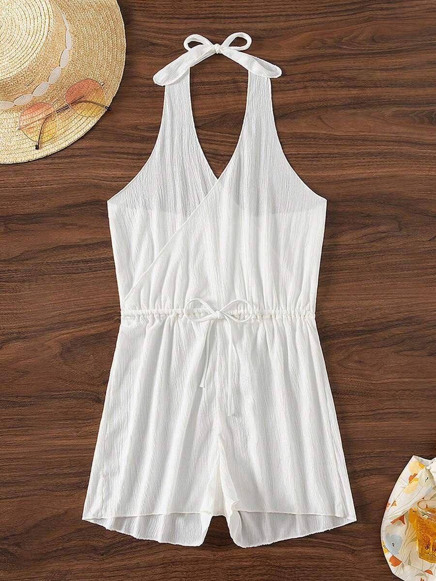One-Piece Solid Color Summer Clothing Set – Cross Tie Top with Zipper Shorts Cover Upتفاصيل الجزء الأمامي لطقم صيفي حريمي بتوب كروس وشورت سحاب أنيق