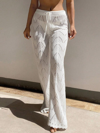 Beach pants with a drawstring woven waistband and small cutouts