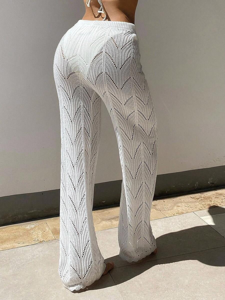 Beach pants with a drawstring woven waistband and small cutouts