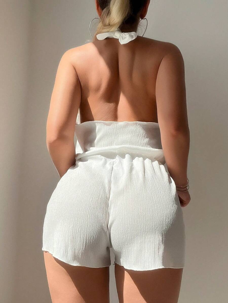 One-Piece Solid Color Summer Clothing Set – Cross Tie Top with Zipper Shorts Cover Up إطلالة أنثوية من الخلف لطقم صيفي حريمي بتوب كروس وشورت سحاب 