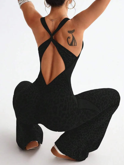 One-piece jumpsuit with a twisted back and deep V-neck in a leopard print